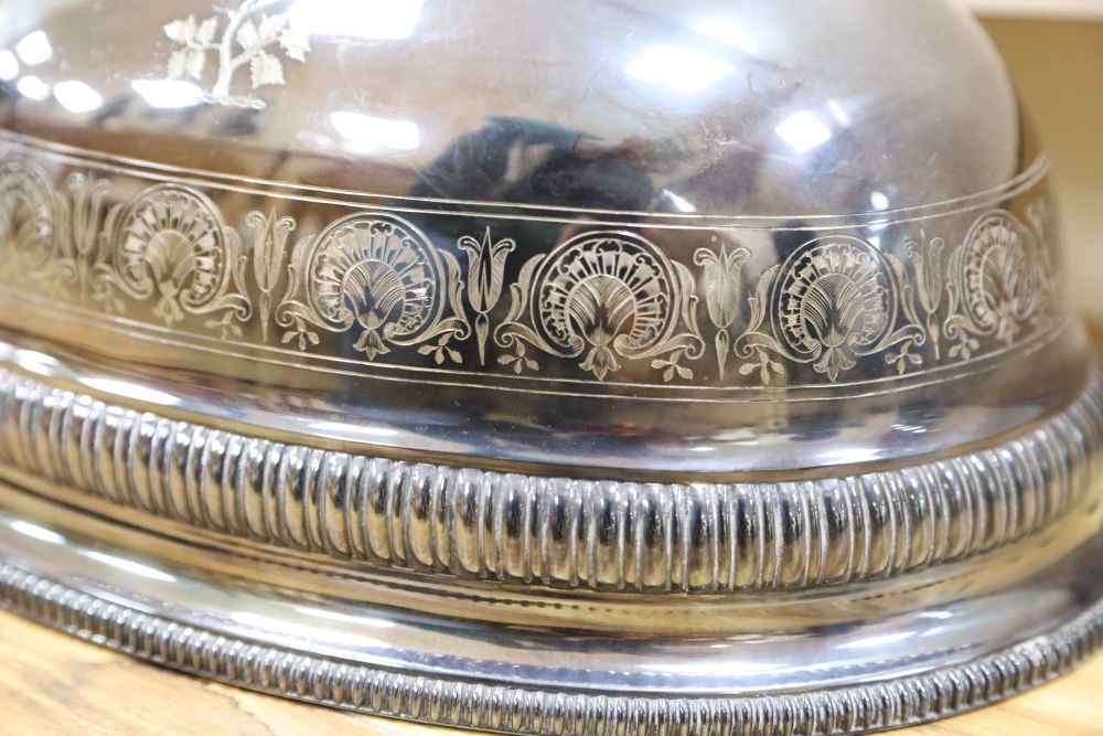 A pair of Victorian silver plated meat domes